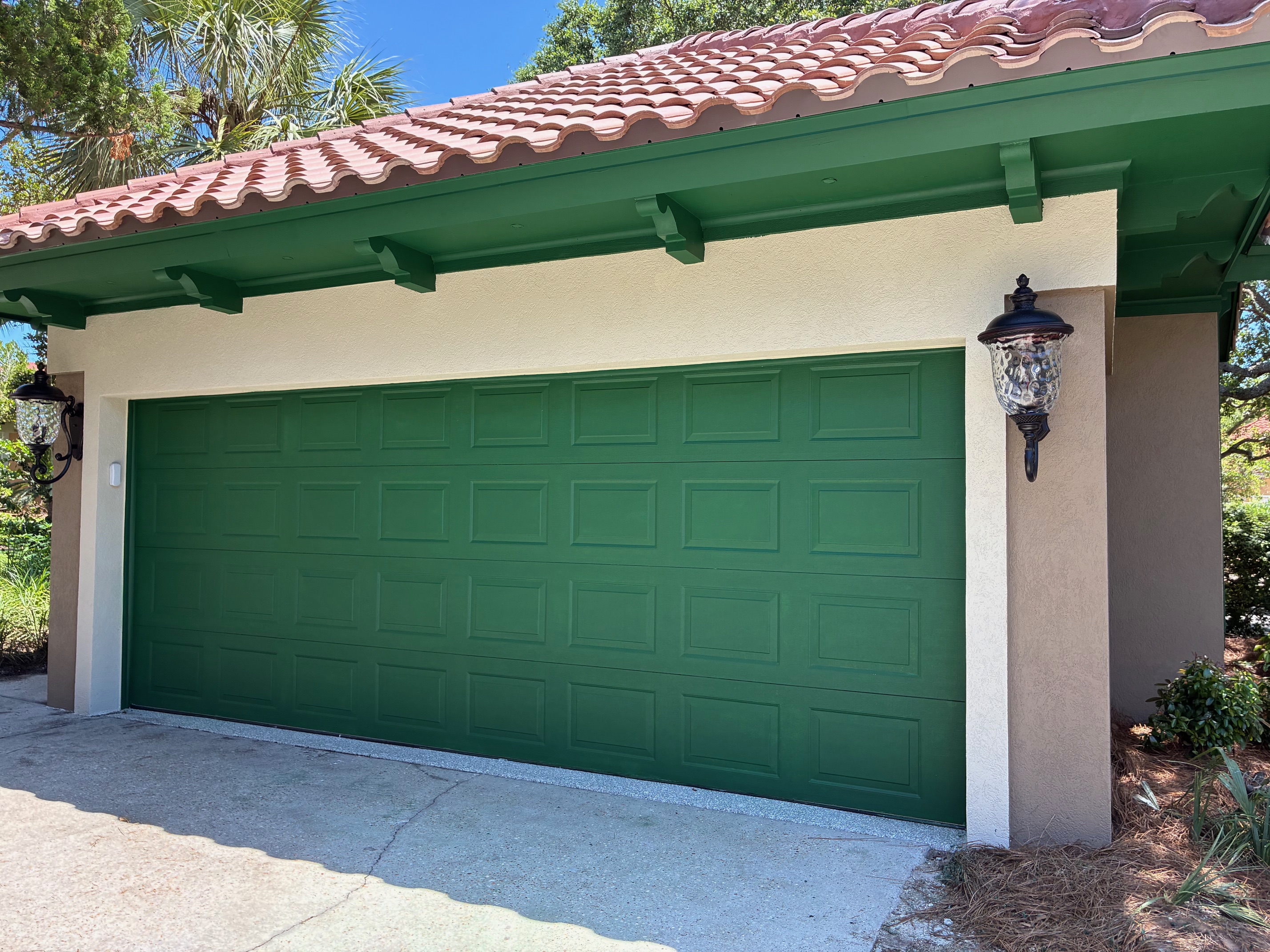 After — finished exterior painting and stucco project by Harvey's Restoration