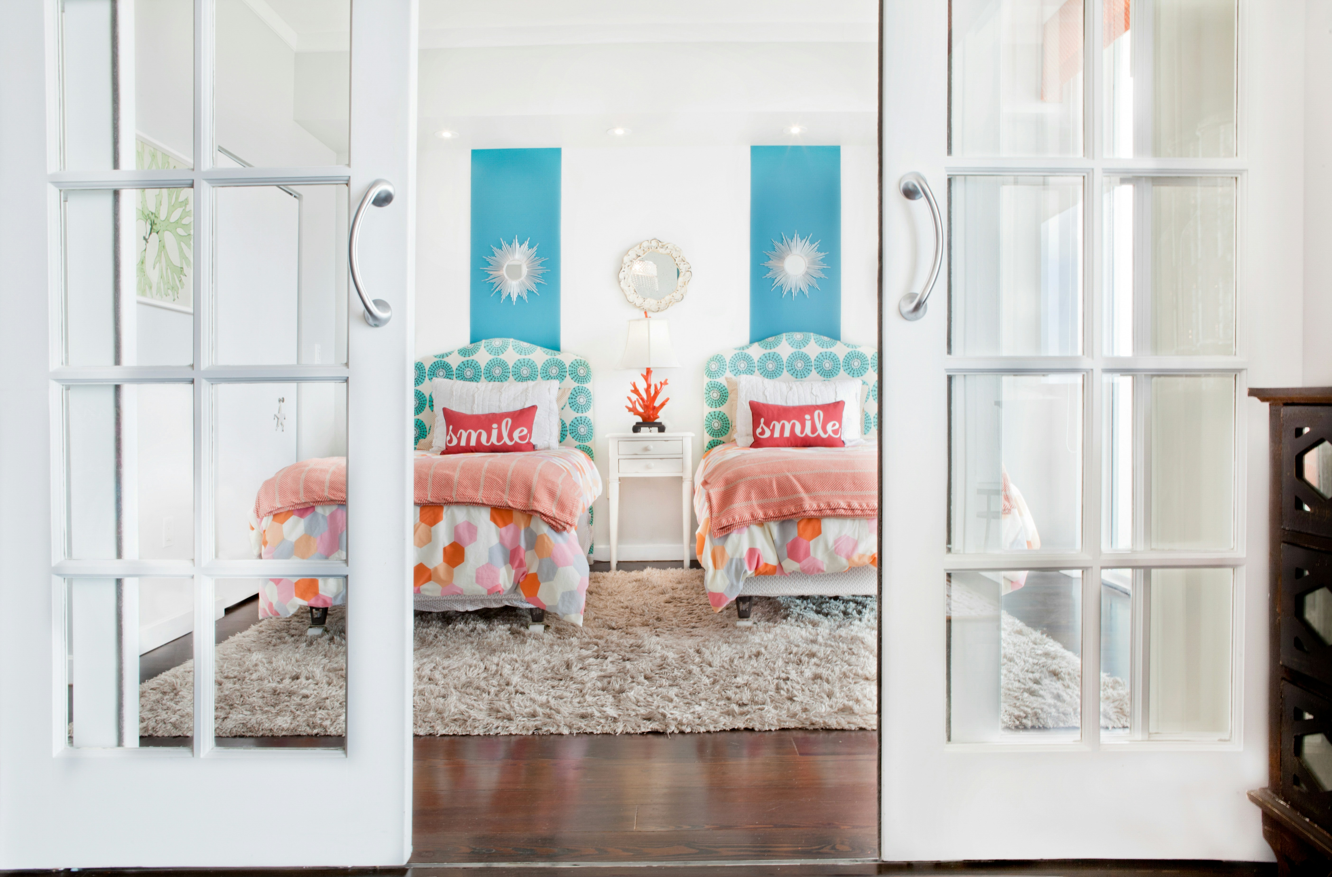 Handyman finish work — French doors opening to a freshly renovated bedroom by Harvey's Restoration